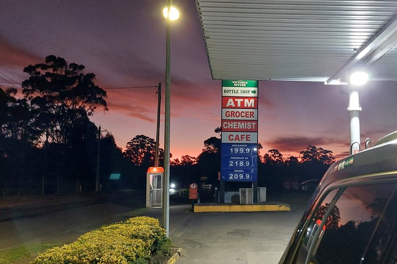 The local service station and shops at Annangrove at dusk