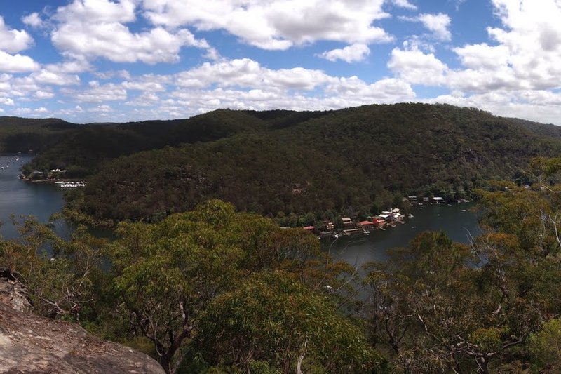 Bushland ridges and the Berowra Creek valley seen from a clifftop above Berowra Heights