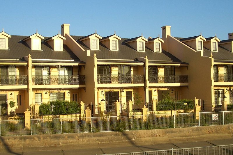 A row of terraces with iron lacework balconies off West Botany Street, Brighton-Le-Sands