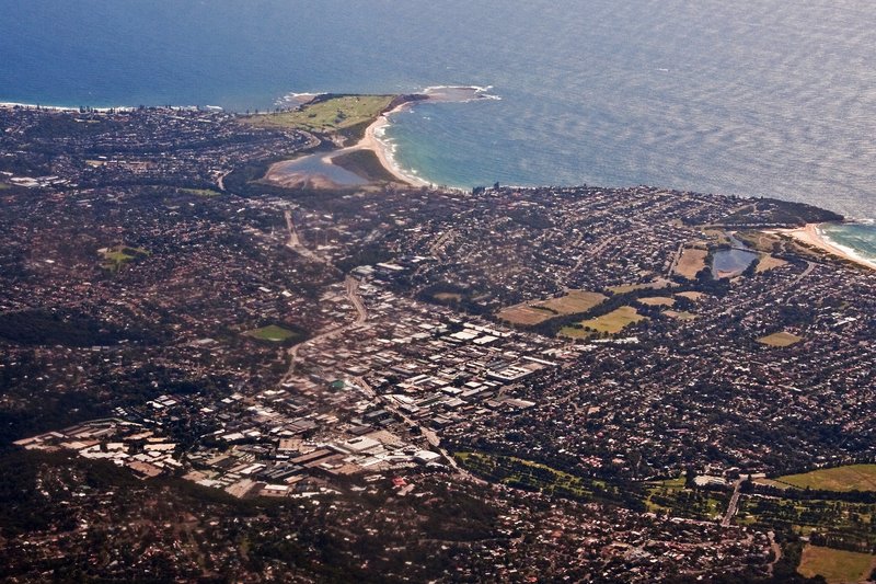 Aerial view over the Brookvale industrial area and surrounding housing towards the coast