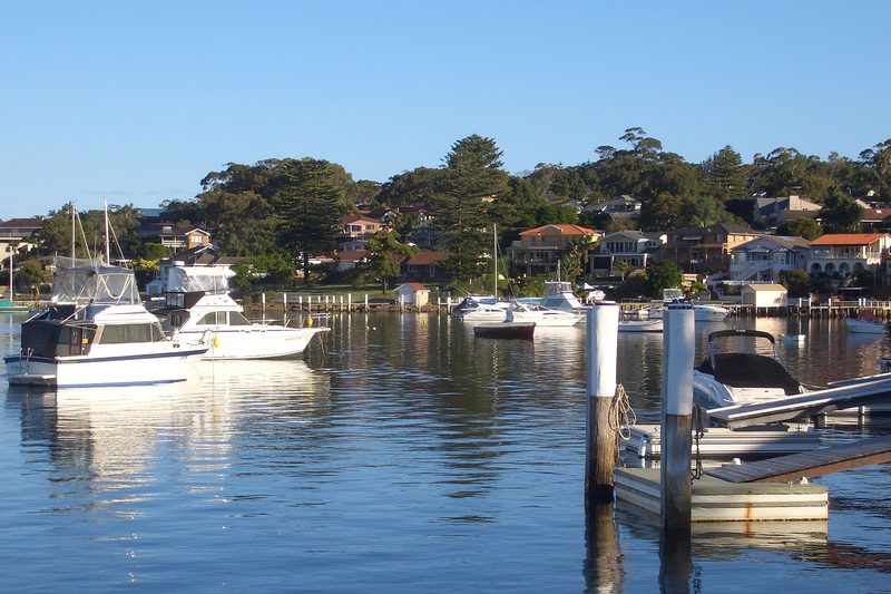 Moored boats and waterfront houses at Burraneer, near the Royal Motor Yacht Club