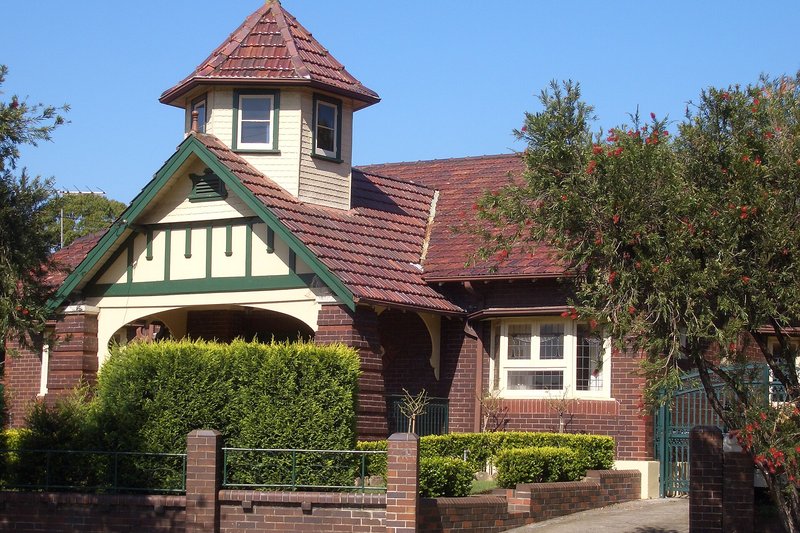 A Federation house with a tiled turret and brick fence, Liverpool Road, Burwood Heights