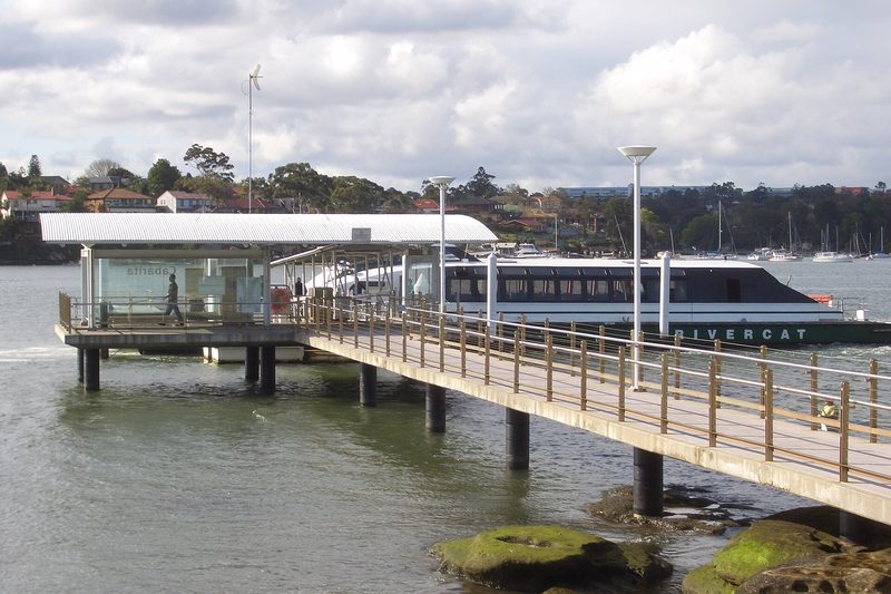 Cabarita ferry wharf on the Parramatta River with a RiverCat alongside