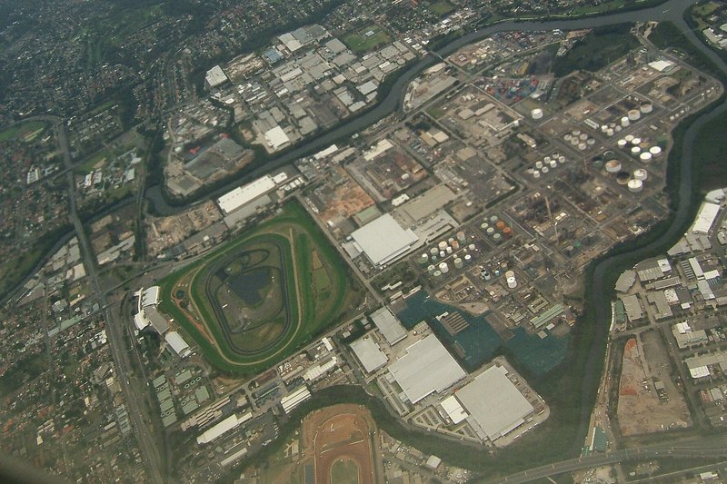 Aerial view of the Camellia industrial peninsula, with tank farms and the river bends