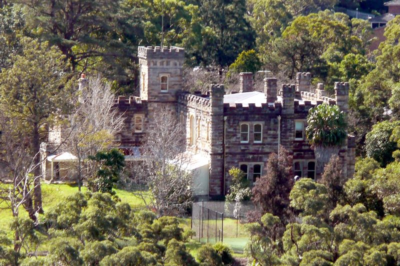 Innisfallen Castle among the trees at Castle Cove, the house the suburb is named after