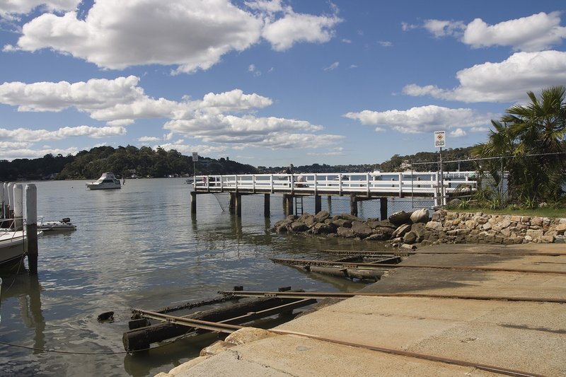 The timber jetty and boat ramp on the Georges River at Como