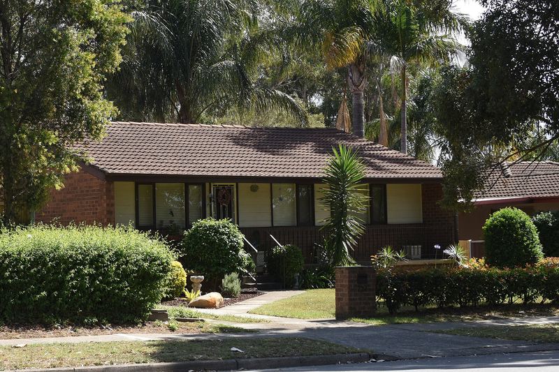 A single storey brick home with established gardens in Doonside