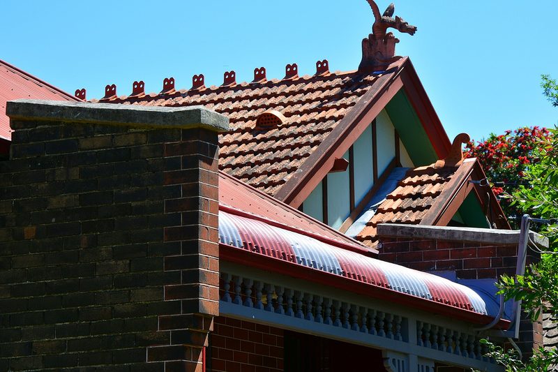 Federation cottage rooflines with terracotta ridge cresting and finial, Erskineville