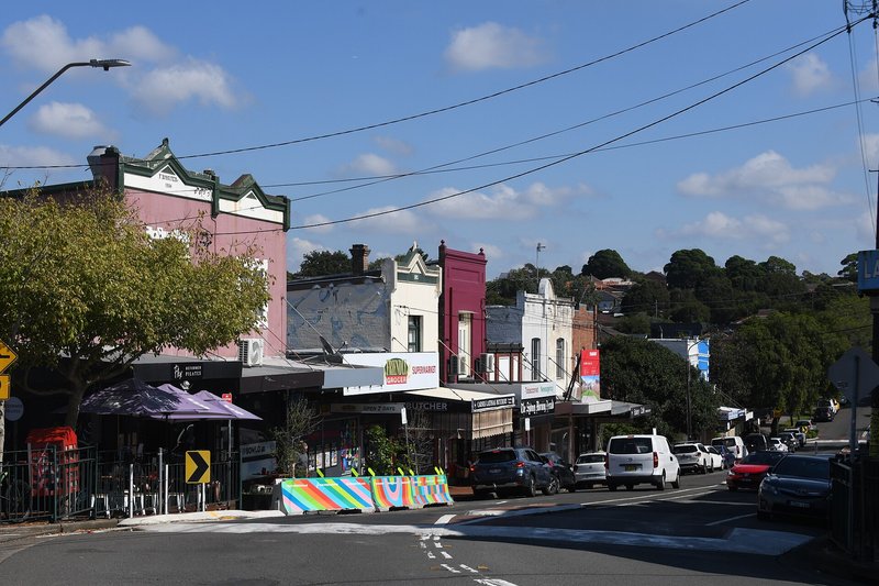 Shops along Crinan Street, Hurlstone Park, with the 1904 and 1905 facades above