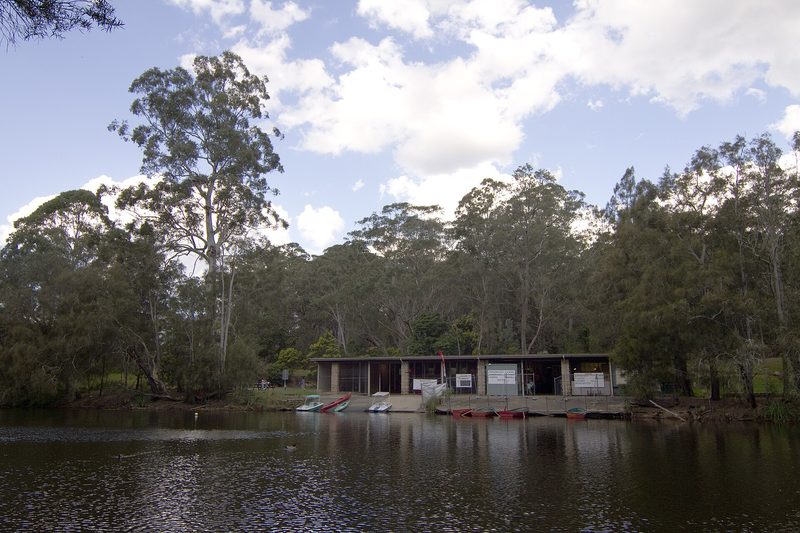 Boat hire kiosk and pedal boats beside the lake at Lindfield