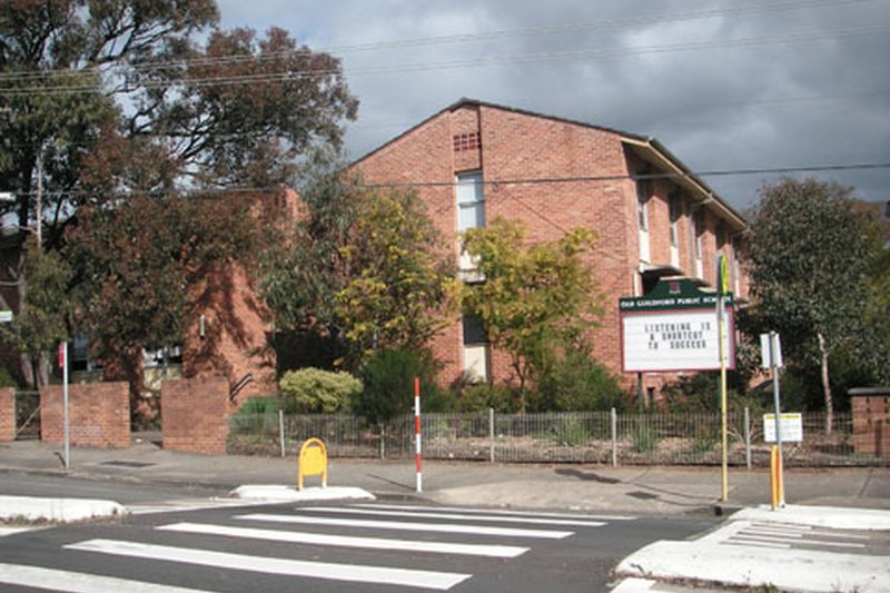 The brick frontage of Old Guildford Public School