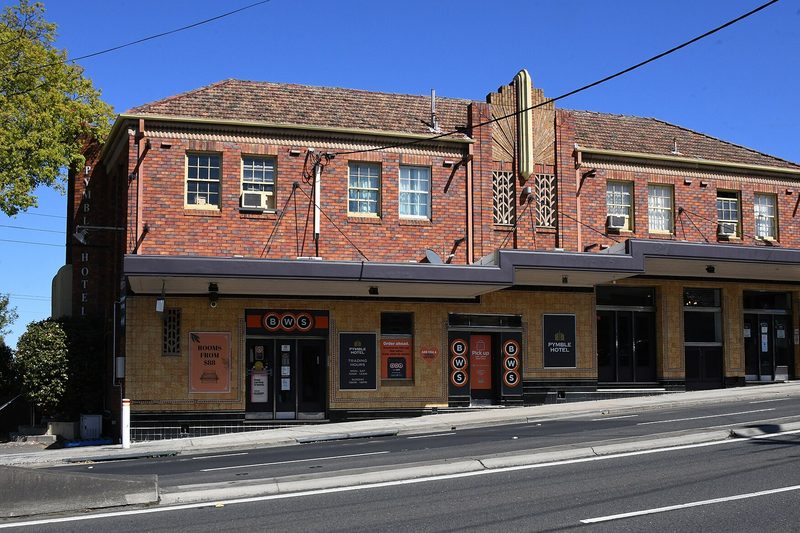 The interwar Pymble Hotel on the Pacific Highway, with its stepped brick parapet