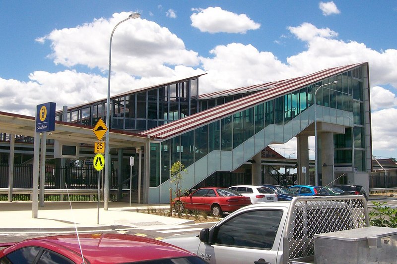 The glazed concourse and stair of Schofields railway station