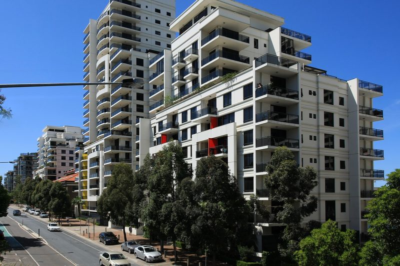 High-rise apartment towers along the street in St Leonards