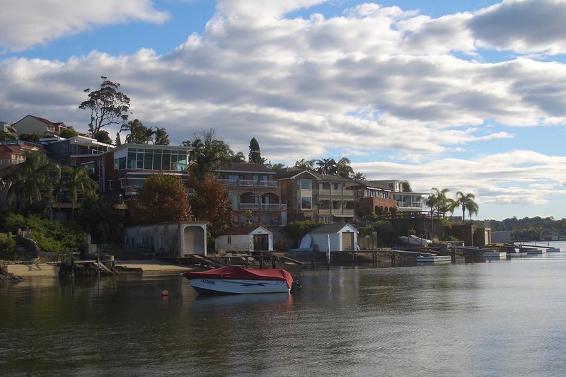 Waterfront homes and boatsheds on the Georges River at Sylvania