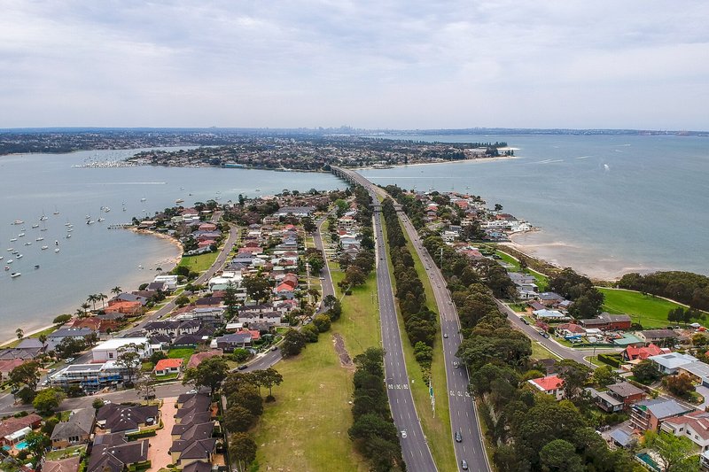 Aerial view along Taren Point Road toward the Captain Cook Bridge and the Georges River
