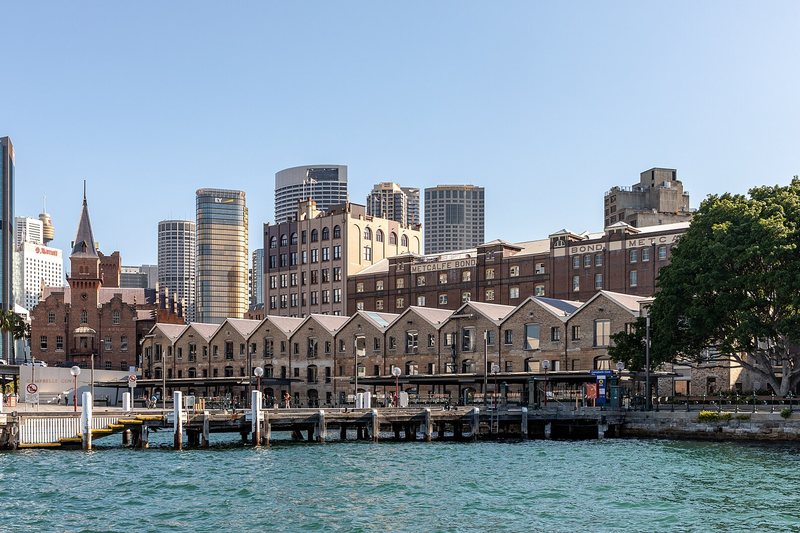 Sandstone finger wharf sheds and the Metcalfe Bond stores along the waterfront at The Rocks