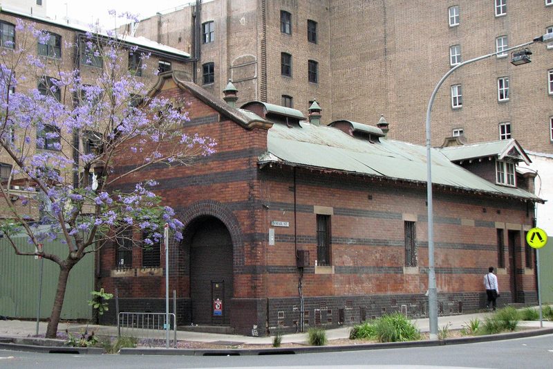 The heritage-listed Ultimo electrical substation on Mountain Street, with a jacaranda in flower