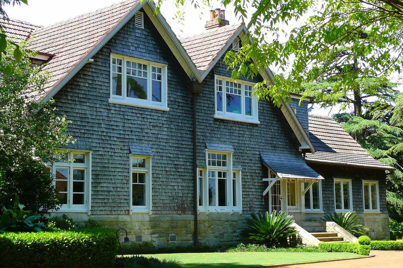 Pibrac, a shingled Federation house on a sandstone base at Warrawee