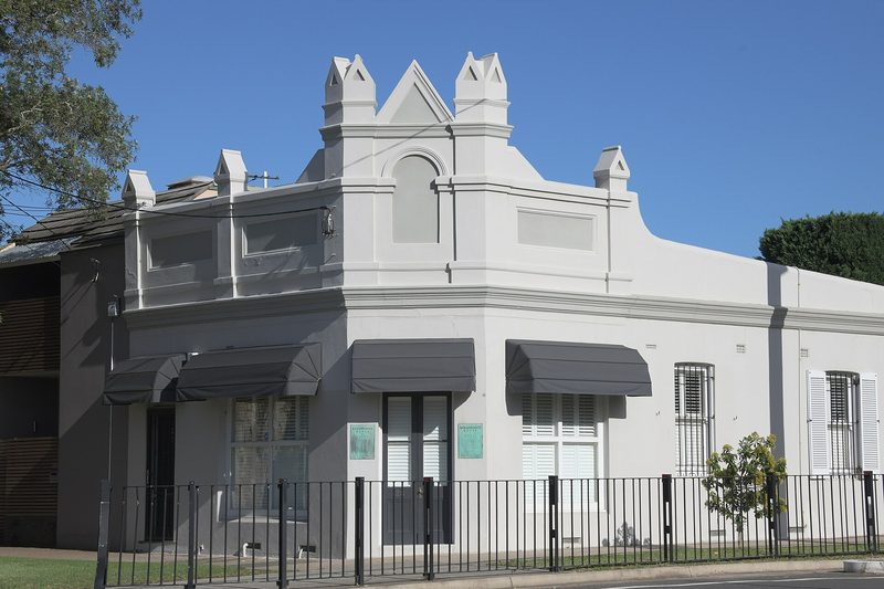 The Italianate facade of Renaissance House on a Willoughby street corner
