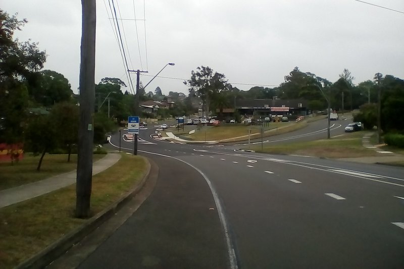 Caroline Chisholm Drive at Winston Hills, with the local shops and houses beyond