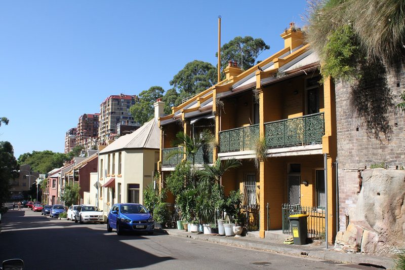Terraces with iron lacework along McElhone Street, Woolloomooloo, below the sandstone escarpment